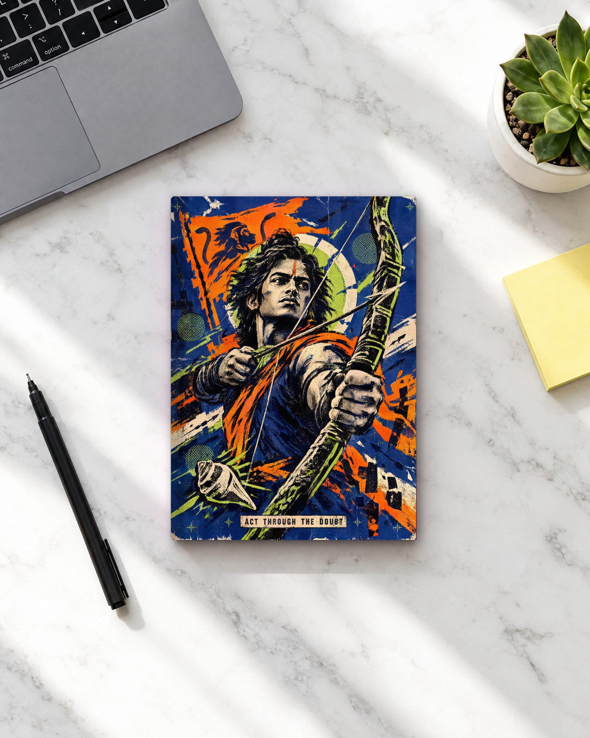 Act Through The Doubt – Arjuna daily planner, planner on a desk