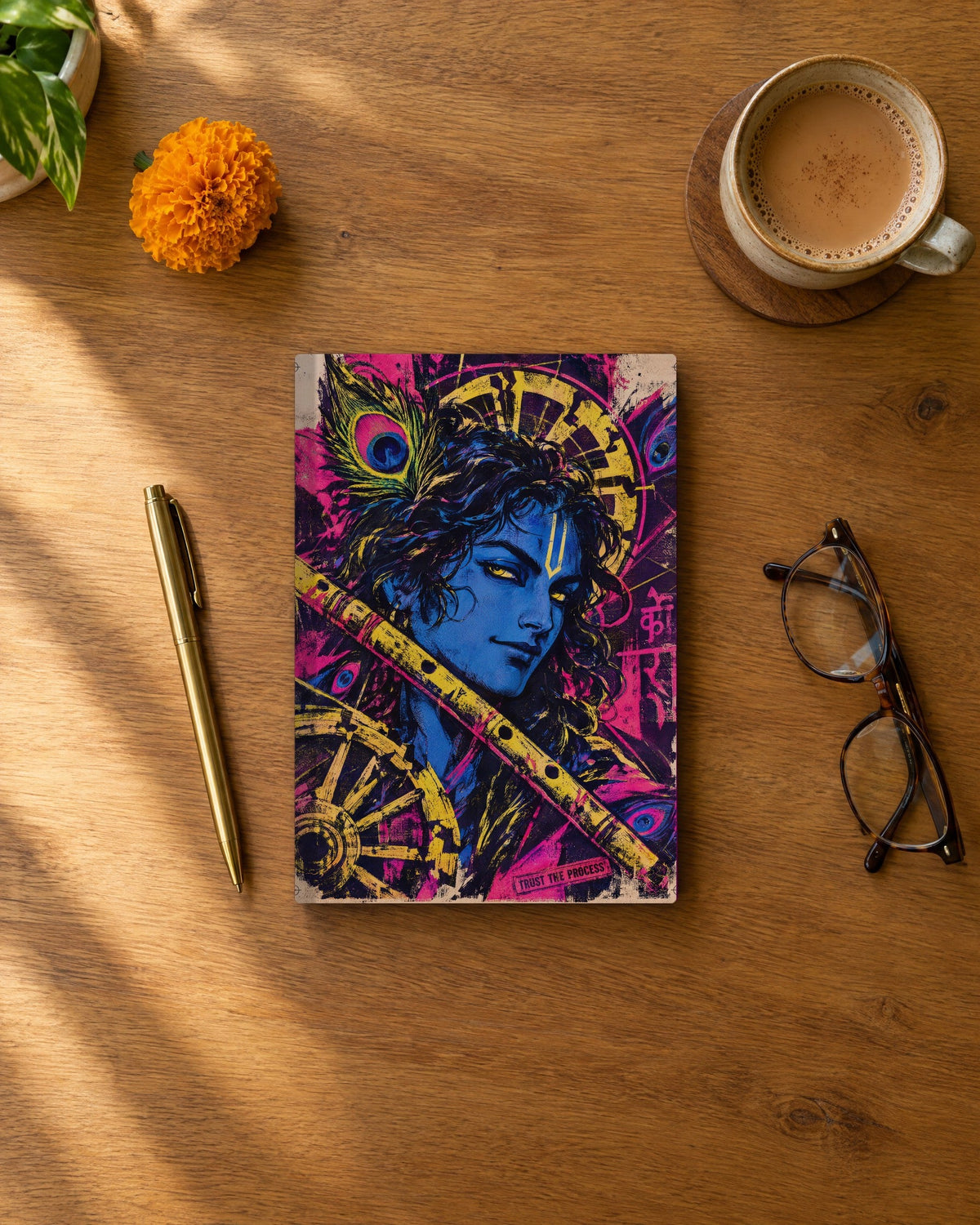 Trust The Process – Krishna daily planner, planner on a wooden desk